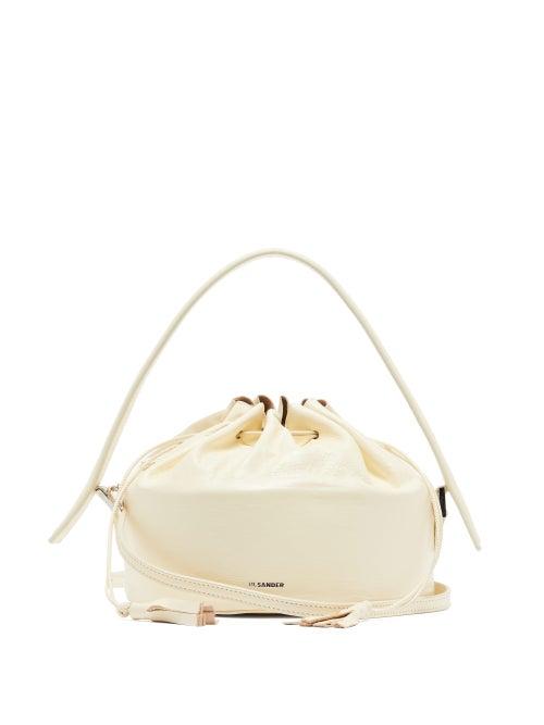 Matchesfashion.com Jil Sander - Drawstring Top Leather Cross Body Drum Bag - Womens - White