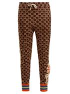 Matchesfashion.com Gucci - Gg Jacquard Mid Rise Jersey Trousers - Womens - Brown Multi