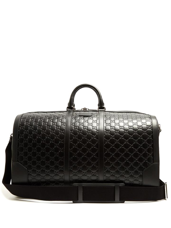 Gucci Gg-debossed Leather Holdall