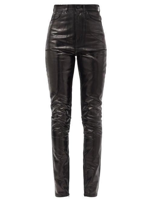 Matchesfashion.com Saint Laurent - Coated High-rise Slim-leg Jeans - Womens - Black