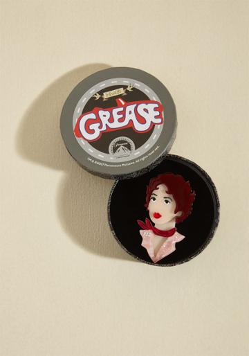  The Boldness, The Brashness, And The Brilliance Of Betty Rizzo Comes To Life Through This Resin Pin From Erstwilder! The Shining Likeness Of The Pink Ladies Leader Is Evident With This Brooch's Ruffled Coif, Candy Apple Red Pout, And Engraved Collar - An