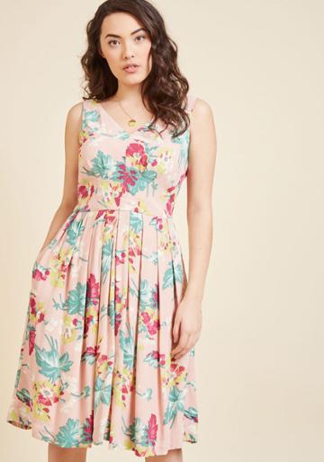 The Individual Details Of This Pocketed Dress By Hard-to-find British Brand Emily And Fin Are Enough To Catch Eyes. Its Painted Florals In Fuchsia, Jade, Lime, And Ivory Hues, Its V-paneled Bodice To Mimic Its Neckline, Its Pleated Skirt - Stunning. But,