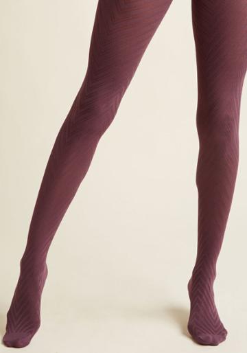 1244 Make Your Entrance In These Chevron-striped Tights, And Guests Will Be Taking Notes On Your Spellbinding Style! Starring Sheer Panels And A Knit Silhouette, This Deep Purple Accessory Is Destined To Start A Trend.