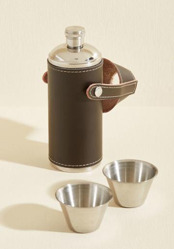 Ba58 Savor A Spirited Swig From This Portable Flask By Kikkerland, Then Share The Rest With Your Camping Crew! Wrapped In Brown Leather, This Cylindrical Vessel Touts A Snap-button Closure And Two Metal Shot Glasses For Convenient Camaraderie.