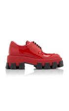 Prada Rubber-trimmed Patent-leather Brogues