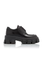 Prada Rubber-trimmed Leather Brogues