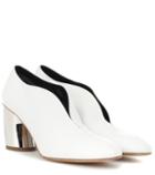 Valentino Leather Curved Heel Pumps