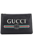 Gucci Printed Leather Pouch