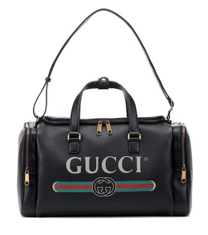 Gucci Gucci Print Leather Travel Bag