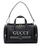Gucci Gucci Print Leather Travel Bag