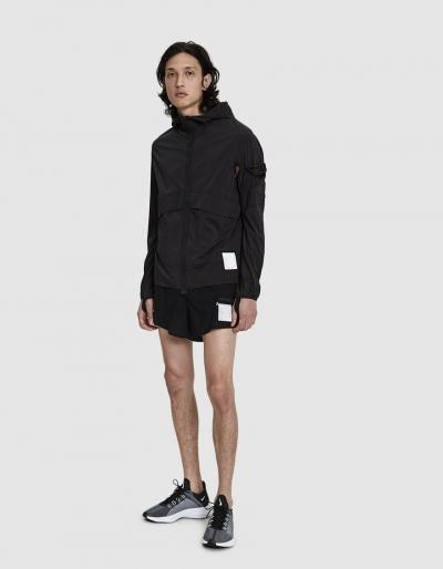 Satisfy Packable Hooded Windbreaker In Black
