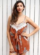 Oasap Spaghetti Strap Backless Floral Tie Front Romper With Tassel