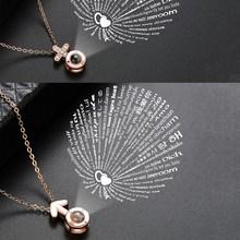 Romwe Arrow & Cross Light Projection Necklace 2pcs