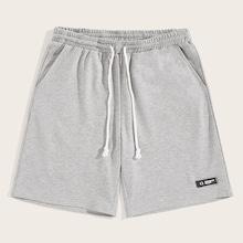 Romwe Guys Drawstring Elastic Waist Patched Shorts