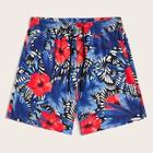 Romwe Guys Jungle Leaf And Floral Print Pocket Patched Shorts