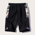 Romwe Guys Letter And Camo Print Pocket Shorts
