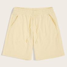 Romwe Guys Elastic Waist Pocket Solid Shorts