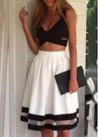 Rosewe V Neck Black Criss Cross Top And White Skirt