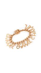 What Goes Around Comes Around Chanel Gold Letters Charm Bracelet