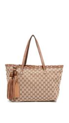 What Goes Around Comes Around Gucci Canvas Tassel Tote Previously Owned 