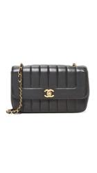 What Goes Around Comes Around Chanel Vertical Flap Bag Previously Owned 