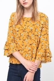  Back Ruffle Top