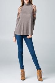  Embroidered Turtleneck Top