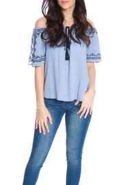  Embroidered Flare Top