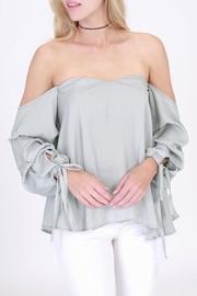  Rita Ruffle Silver Top