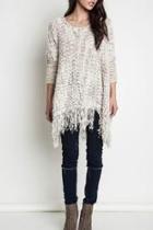 Chunky Knit Fringed Sweater