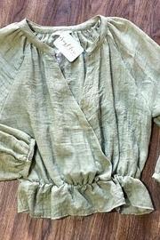  Peplum Surplice Top