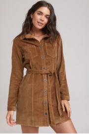 Ls Ruffle Hem Belted Dress