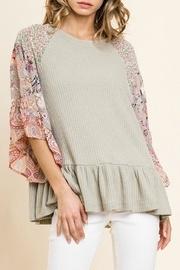  Ruffle-sleeve Peplum Top