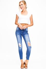  Frayed Hem Distressed Skinny Jeans