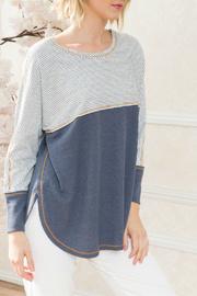 Mix Stripe And Thermal Dolman Sleeve Top. Casual, Weekend Must Have. Loose Fitting And Full Of Comfort. Model Wearing Size Small.