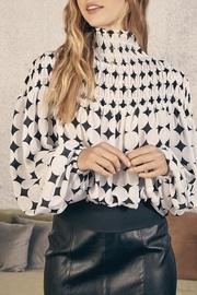  Geo Print Smocked Mock Turtleneck Blouse
