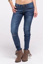  Slashed Skinny Jeans