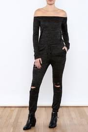  Ripped Leg Jumpsuit