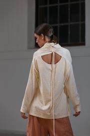  Coat Origen