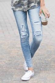  Patched Distressed Jegging