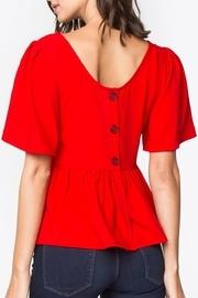  Back-button Peplum Top