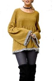  Fringed Peplum Sweater