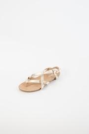  Twisty Flat Sandals