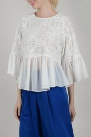  Flowy Embroidered Top