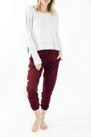  Arm Slit Banded Hem Sweatshirt