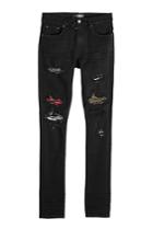 Amiri Amiri Distressed Jeans With Printed Patches