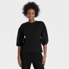 Women's Long Sleeve Round Neck Eyelet Top - A New Day Black