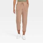Women's Tapered Stretch Woven Pants - All In Motion Taupe