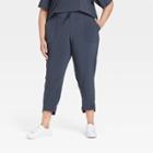 Women's Plus Size Tapered Stretch Woven Pants - All In Motion