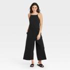 Women's Sleeveless Smocked Cinched Jumpsuit - A New Day Black